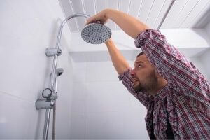 Man Installing Shower Head