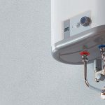 Water heater with metallic body and control panel, showcasing tankless heating efficiency for home plumbing and heating.